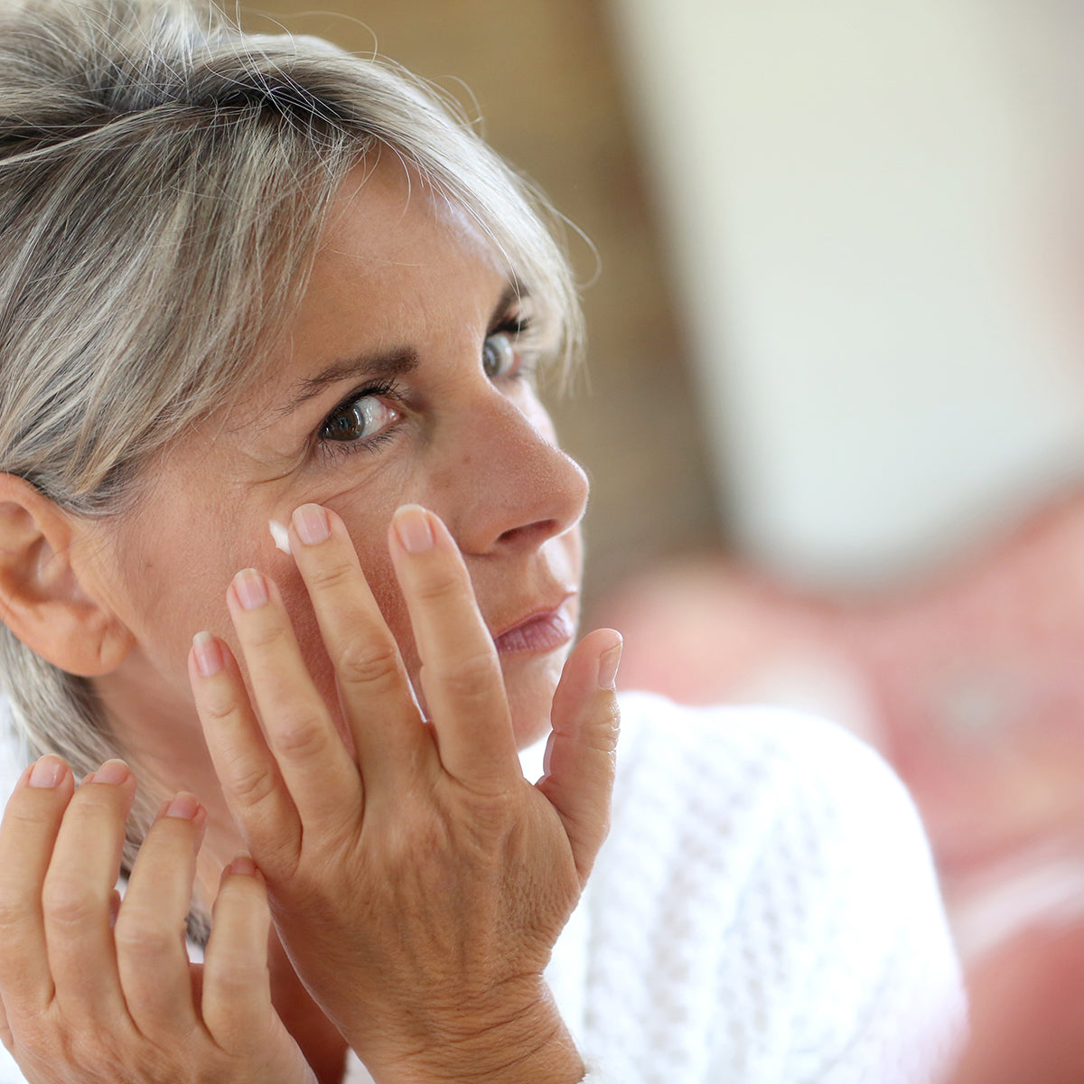 Woman using Foundation Skincare Niacinamide Lotion for brightness and hyperpigmentation